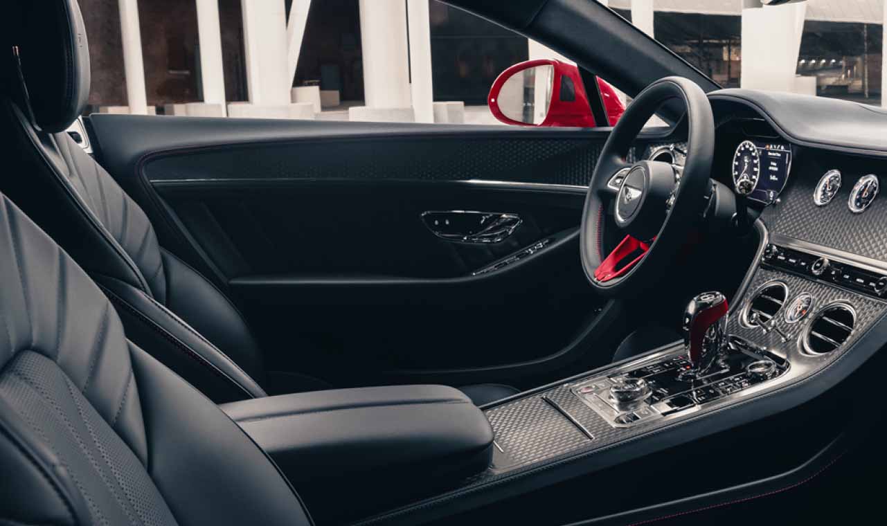 The Edition 8 center dashboard hosts the Bentley Rotating Display, offering three styles: a touchscreen for infotainment, three analogue dials, or uninterrupted veneer.