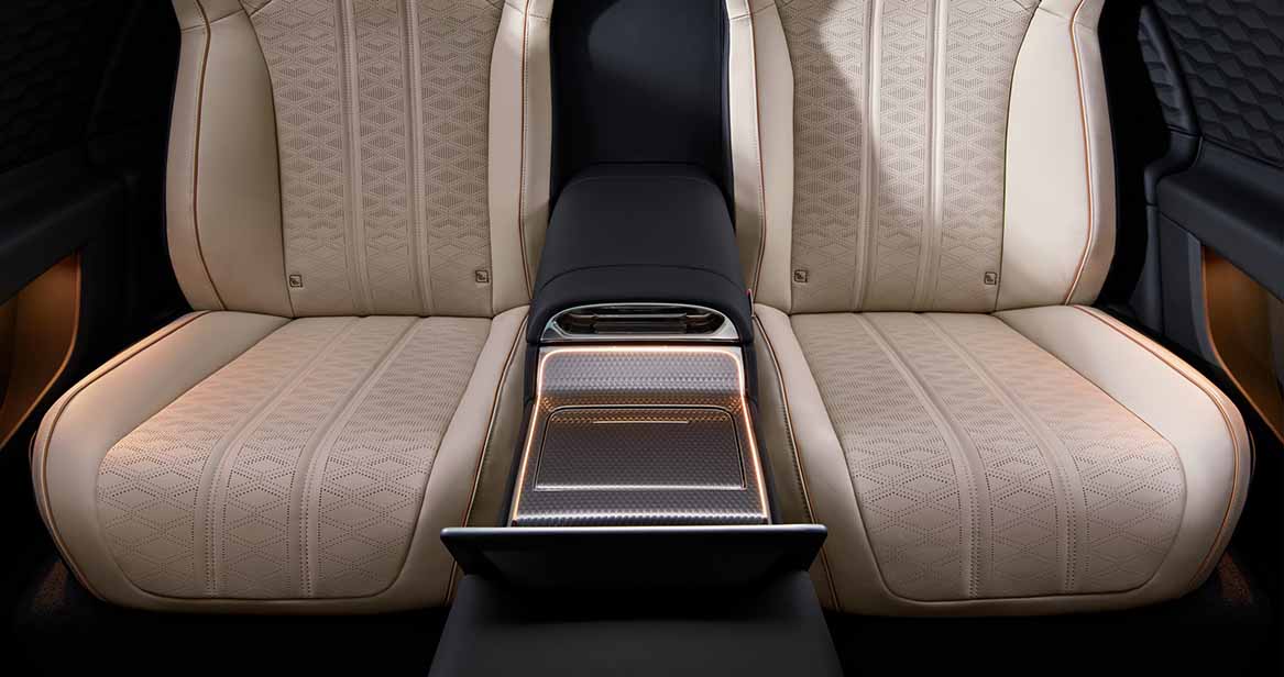 Rear passenger seating with touchscreen access for comfort