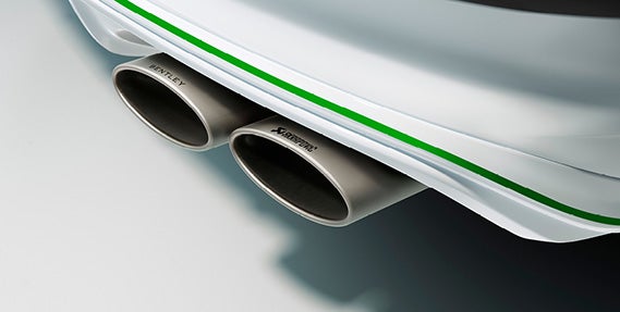 Twin Akrapovic performance exhaust tips on the 2026 Bentley Bentayga Speed, featuring precision engineering and sporty rear styling.