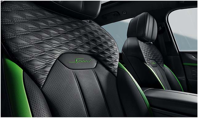 Diamond-quilted leather seats with green Speed embroidery in the 2026 Bentley Bentayga Speed, featuring high-performance luxury interior.