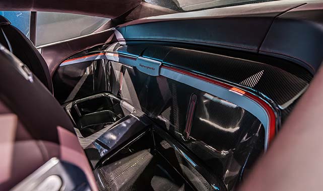 High-performance rear compartment of the 2026 Bentley Supersports with exposed carbon fiber panels and Supersports badging.