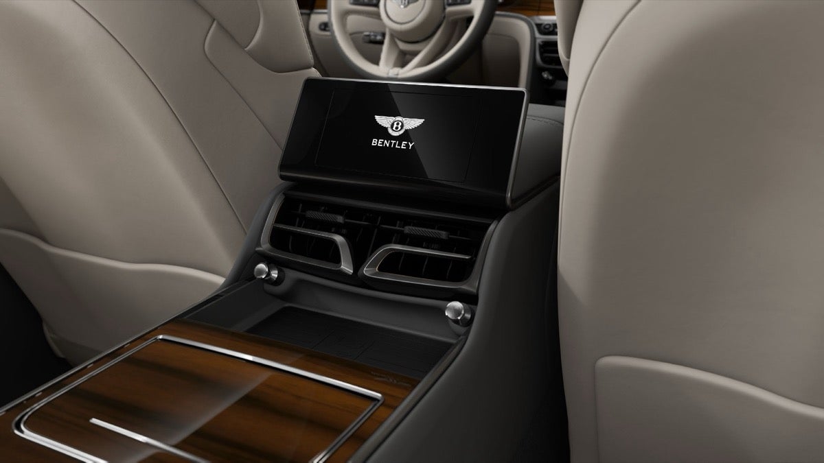 Rear centre console of a 2027 Bentley Flying Spur with the removable Touchscreen Remote