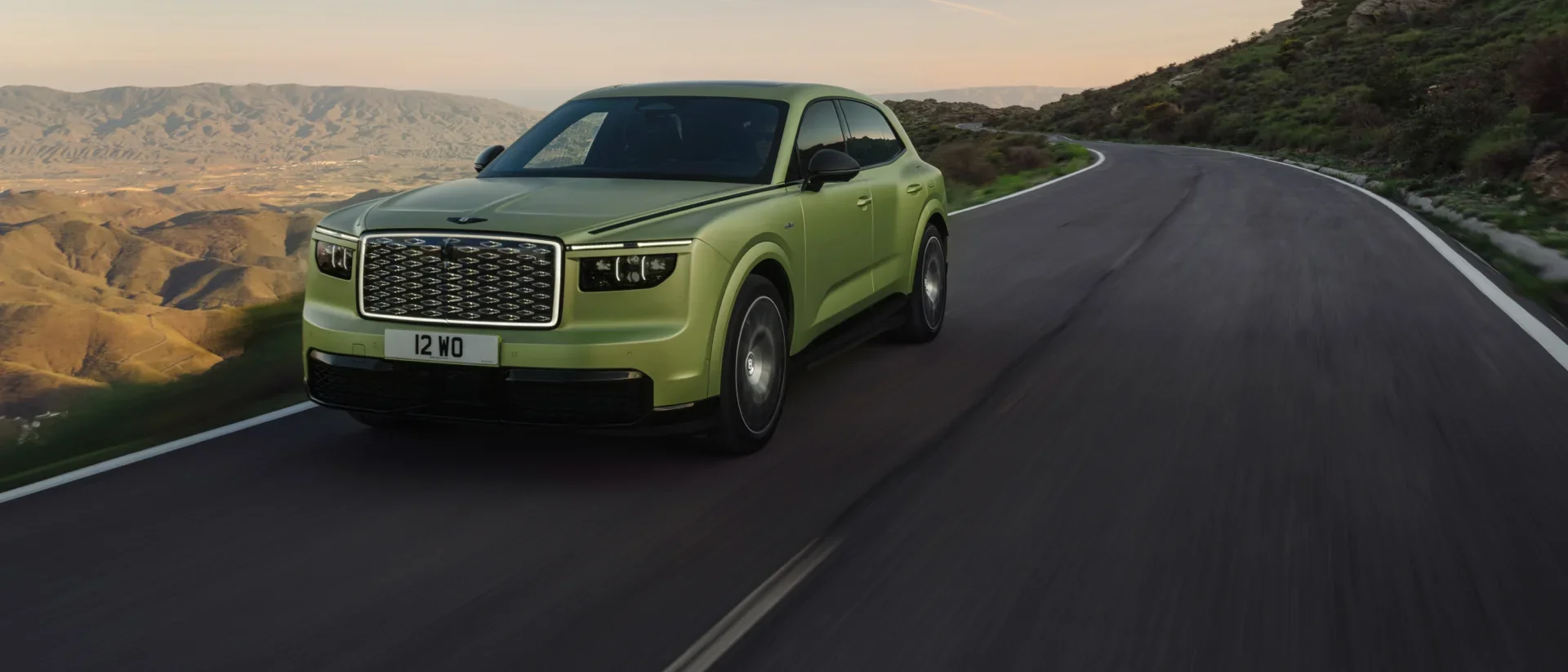 Bentley Torcal S First Edition in Electrum Satin driving on a mountain road