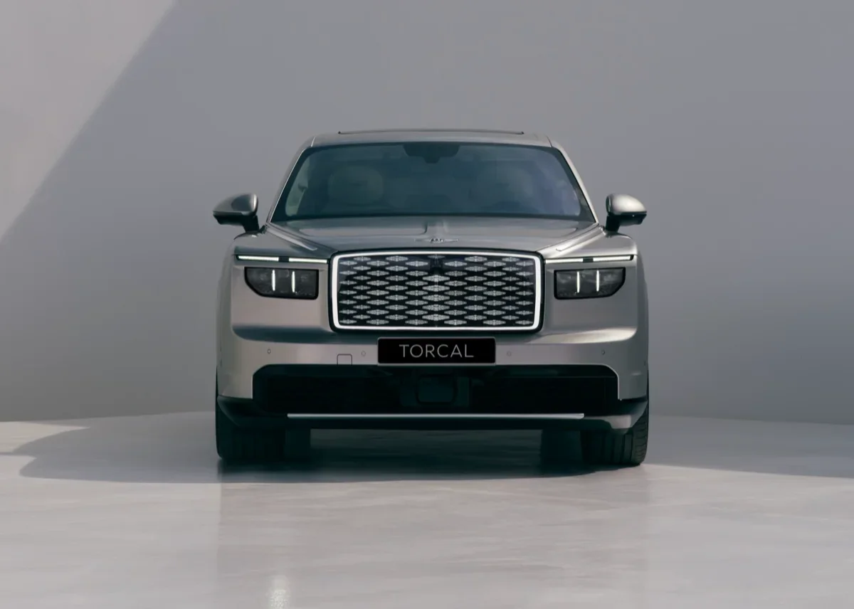 Front view of the Bentley Torcal showing the illuminated diamond grille and split headlamps