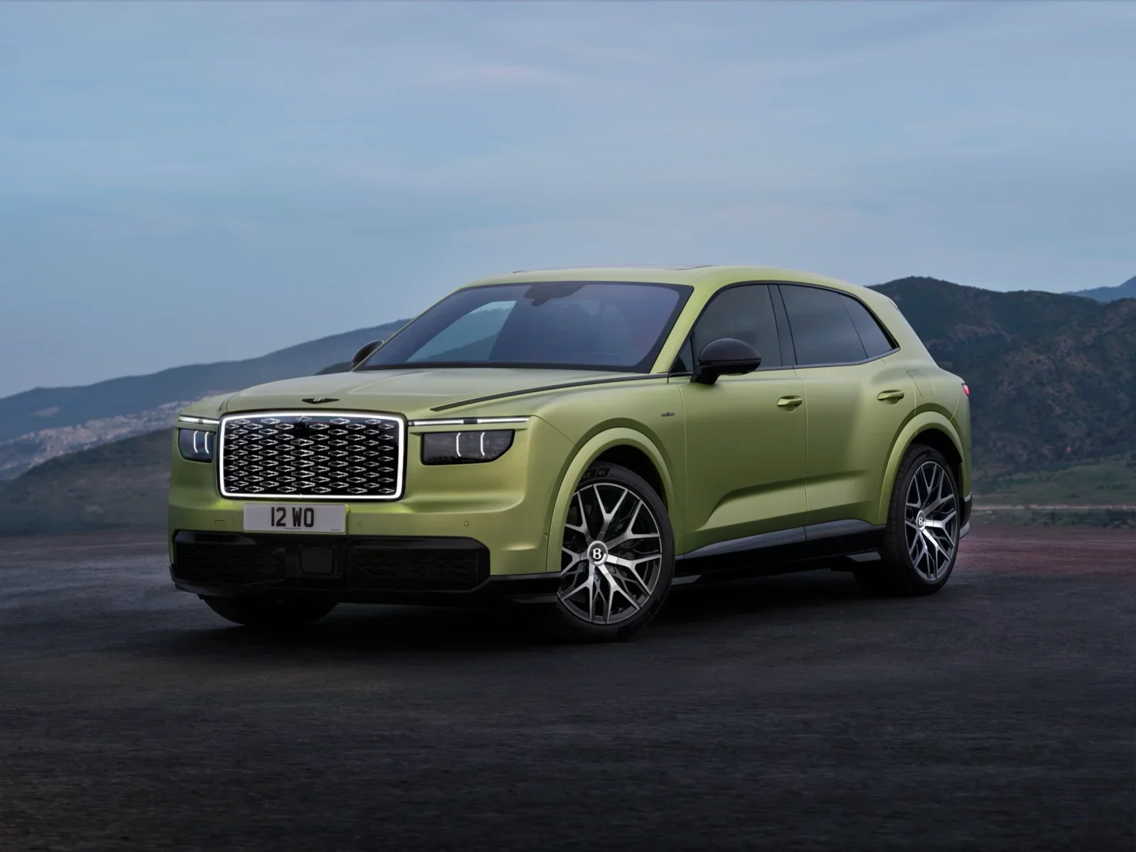 Bentley Torcal S First Edition in Electrum Satin parked against a mountain backdrop
