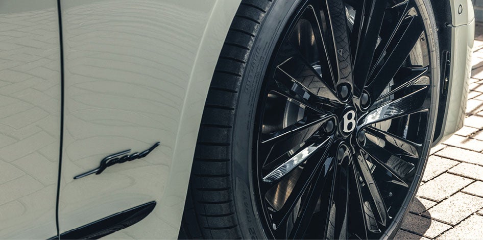 Speed Edition 12 badges on the ‘D’ pillars, while silver brake callipers can be seen through the spokes of the imposing 22” Speed wheels