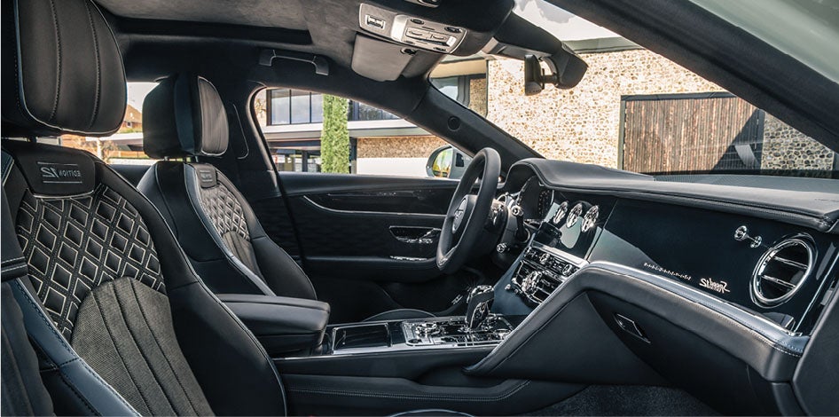 Grand black veneers provide a rich, dark backdrop for the cabin’s bespoke detailing