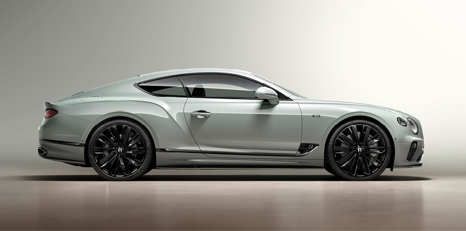 Continental GT Speed Edition 12 side profile with Silver-painted brake callipers peek through the spokes of the 22” Speed wheels